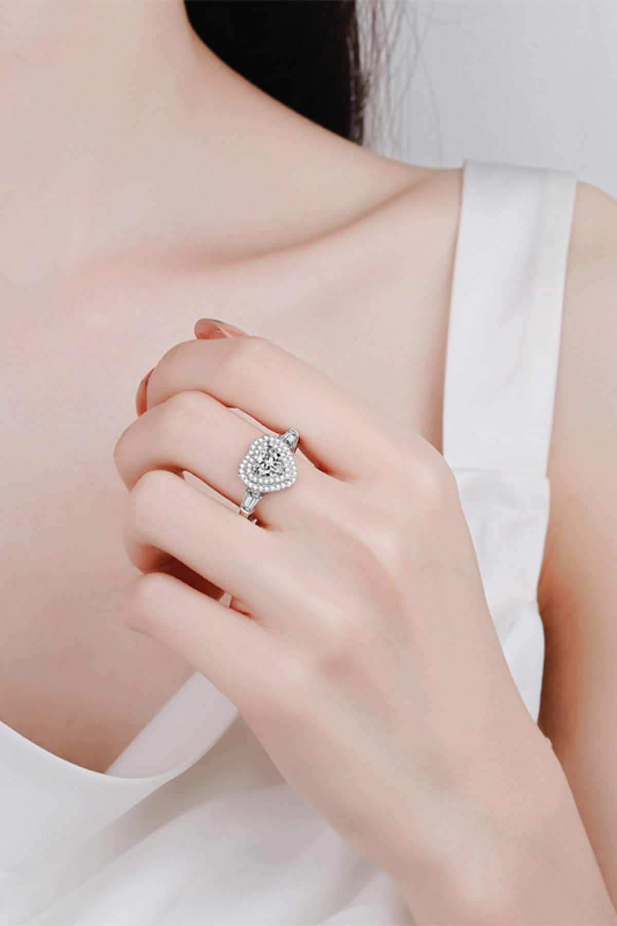 1 Carat Moissanite 925 Sterling Silver Heart Ring on woman's hand.