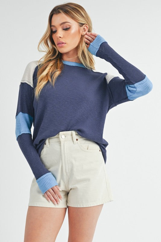 Aemi + Co Raw Seam Color Block Round Neck Knit Top