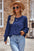 Ruched round neck lantern sleeve blouse in blue with smocked detailing.