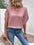 Lace detail V-neck half sleeve blouse in pink, worn with jeans.