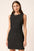 Mittoshop Tweed Sleeveless Mini Dress in textured fabric with a round neck and flirty mini length.