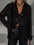 Sequin button-up long sleeve shirt in sheer black polyester.