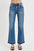 Full-size raw hem ankle bootcut jeans with a trendy bootcut style, showcasing a flattering fit in plus size.