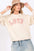 SAGE + FIG LOVE Path Applique Drop Shoulder Sweatshirt with LOVE patch and relaxed fit.