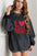 Valentine’s Day LOVE round neck long sleeve sweatshirt with red and pink lettering.