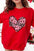 Valentine's Day red sweatshirt with 'Be Mine' heart design.