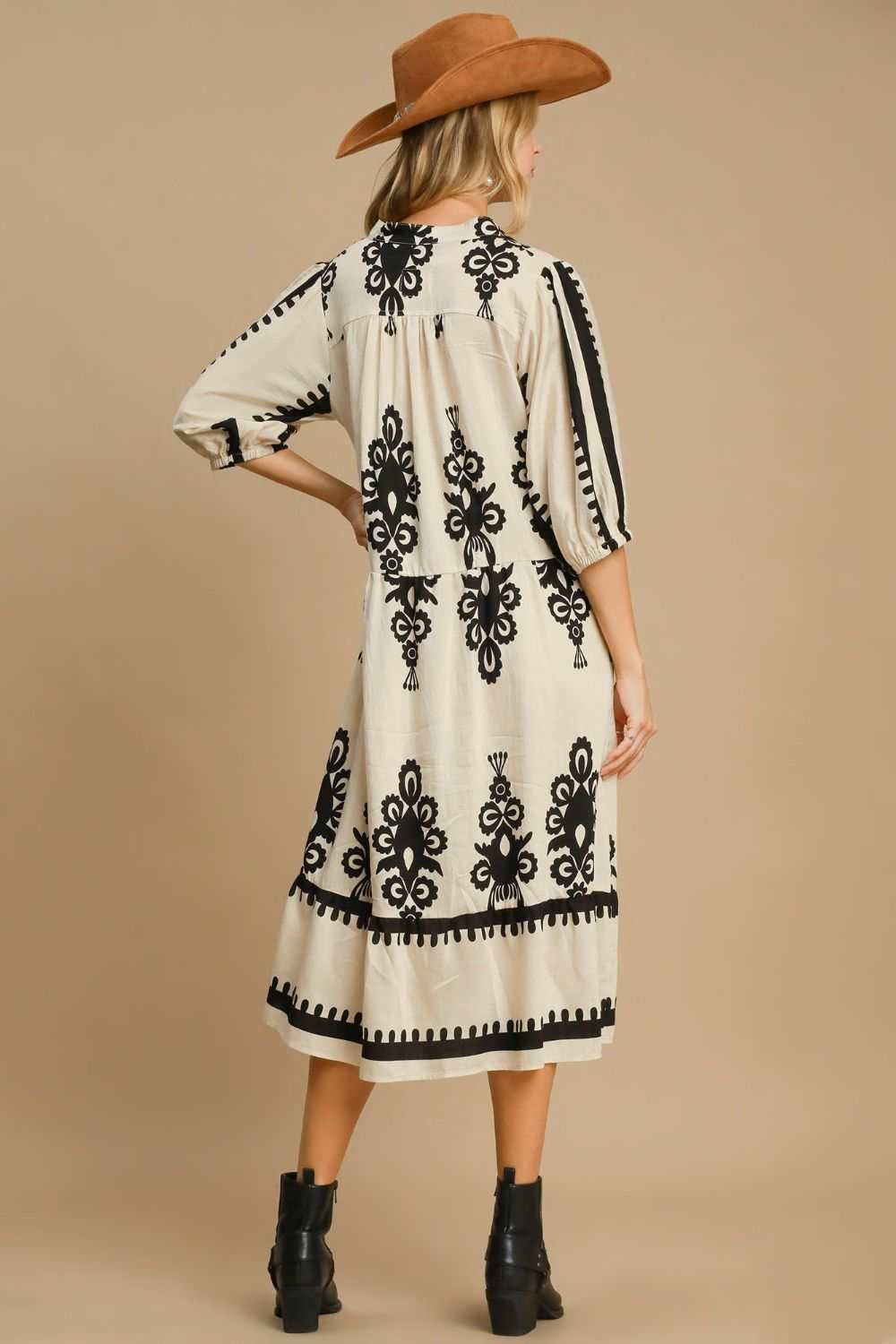 Umgee Printed Notched Midi Dress with chic design and ruffled style.