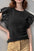 Ruffled round neck cap sleeve blouse in black with slightly stretchy material.