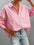 Pink and white striped button-down long sleeve shirt with pocket detail.