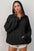 Full size half zip long sleeve hoodie with kangaroo pocket in black.