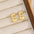 18K Gold-Plated Bubble Letter Stud EarringsMyMooiaTrendsiPieces: 1-pair
Material: 18K gold-plated, Copper
Care instructions: Avoid wearing during exercise, as sweat will react with the jewelry to produce silver chloride an18K Gold-Plated Bubble Letter Stud Earrings