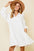 Ces Femme Johnny Collar Balloon Sleeve Mini Dress in white with stylish Johnny collar and voluminous sleeves.