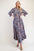 Celeste full size ruffle hem paisley round neck dress with elegant print design.