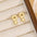 18K Gold-Plated Bubble Letter Stud EarringsMyMooiaTrendsiPieces: 1-pair
Material: 18K gold-plated, Copper
Care instructions: Avoid wearing during exercise, as sweat will react with the jewelry to produce silver chloride an18K Gold-Plated Bubble Letter Stud Earrings