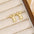 18K Gold-Plated Bubble Letter Stud EarringsMyMooiaTrendsiPieces: 1-pair
Material: 18K gold-plated, Copper
Care instructions: Avoid wearing during exercise, as sweat will react with the jewelry to produce silver chloride an18K Gold-Plated Bubble Letter Stud Earrings