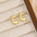 18K Gold-Plated Bubble Letter Stud EarringsMyMooiaTrendsiPieces: 1-pair
Material: 18K gold-plated, Copper
Care instructions: Avoid wearing during exercise, as sweat will react with the jewelry to produce silver chloride an18K Gold-Plated Bubble Letter Stud Earrings