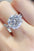 5 Carat Moissanite 925 Sterling Silver Ring on hand, showcasing its brilliance.