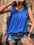 Blue button detail round neck tank top with ruched design, paired with denim shorts.