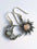 Alloy Moon & Sun Dangle EarringsMyMooiaTrendsiPieces: 1-pair
Material: Moonstone, Alloy
Care instructions: Avoid wearing during exercise, as sweat will react with the jewelry to produce silver chloride and coppeAlloy Moon & Sun Dangle Earrings