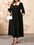 Plus size contrast collared neck long sleeve midi dress in black.