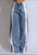 Contrast side striped wide leg jeans with pocket, no stretch, blue and white design.