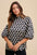 Annie Wear Tie Back Abstract Print Mock Neck Half Sleeve Blouse with artistic design.