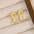 18K Gold-Plated Bubble Letter Stud EarringsMyMooiaTrendsiPieces: 1-pair
Material: 18K gold-plated, Copper
Care instructions: Avoid wearing during exercise, as sweat will react with the jewelry to produce silver chloride an18K Gold-Plated Bubble Letter Stud Earrings