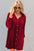 Full size collared neck long sleeve buttoned mini dress in red.