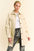 Davi & Dani Faux Leather Button Up Jacket with Chest Pockets, stylish outerwear in cream color.