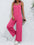 Scoop neck tie shoulder jumpsuit with pockets in pink, made from polyester spandex blend.