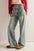 Washed wide leg jeans with pockets, no stretch, 65% cotton and 55% polyester.