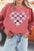 Valentine’s Day sequin checkered heart long sleeve sweatshirt in red.