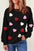 Valentine's Day contrast heart long sleeve sweatshirt in black with colorful heart accents.