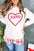 XOXO Heart Round Neck Dropped Shoulder Sweatshirt, basic style, slightly stretchy, white with heart design.