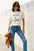 Simply Love Full Size ROCK ＆ LOVE Short Sleeve T-Shirt, basic style, 100% cotton, worn by a model with jeans.