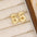 18K Gold-Plated Bubble Letter Stud EarringsMyMooiaTrendsiPieces: 1-pair
Material: 18K gold-plated, Copper
Care instructions: Avoid wearing during exercise, as sweat will react with the jewelry to produce silver chloride an18K Gold-Plated Bubble Letter Stud Earrings