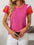 Mandy contrast round neck short sleeve knit top in pink and red, featuring moderate stretch and vibrant color.