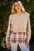 Full size double layered plaid contrast sweatshirt, featuring cozy design and relaxed fit for casual wear.