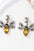 Natural Stone Bee Dangle EarringsMyMooiaTrendsiPieces: 1-pair
Material: Alloy, Natural stone
Care instructions: Avoid wearing during exercise, as sweat will react with the jewelry to produce silver chloride and cNatural Stone Bee Dangle Earrings