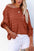 Round neck long sleeve knit top, slightly stretchy, acrylic and nylon blend.