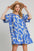 Two tone abstract print puff sleeve dress with feminine design.