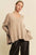 Davi & Dani ribbed side slit V-neck sweater in beige.