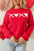 Valentine’s Day XOXO red sweatshirt with round neck and drop shoulder design.