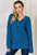 Basic Bae full-size ribbed half-button long sleeve t-shirt in blue.