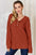 Basic Bae full size ribbed half button long sleeve t-shirt in rust brown.