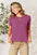 Basic Bae Full Size Round Neck Short Sleeve T-Shirt in purple, worn by a woman.