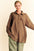 Davi & Dani waffle-knit button-down shirt in brown with pockets and textured design.