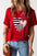 Heart round neck short sleeve t-shirt with heart print in red, slightly stretchy material.