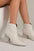 Beast Fashion PU leather block heel boots with back zippers in white, stylish and versatile.