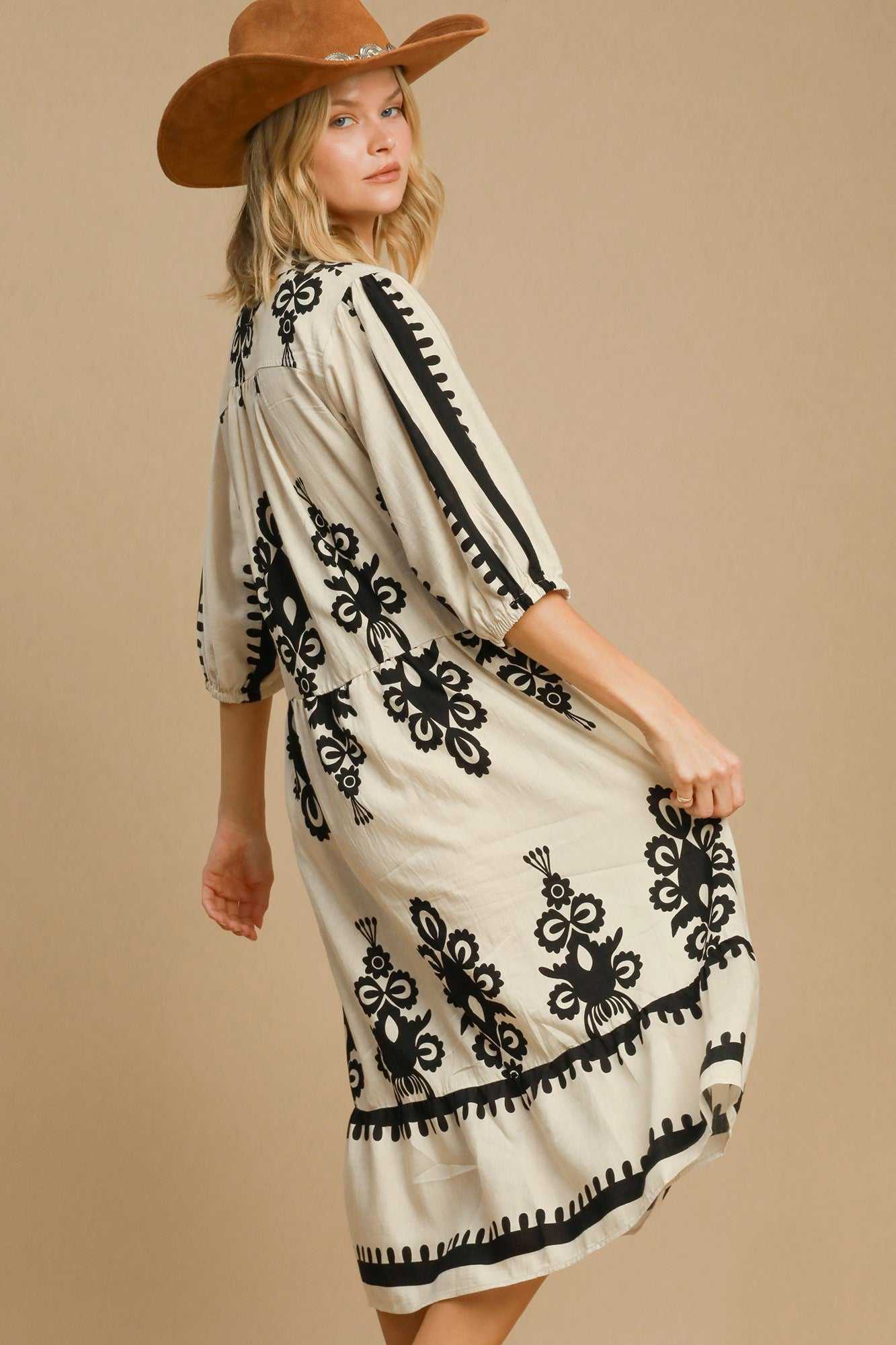 Umgee Printed Notched Midi Dress with chic print and notched neckline.